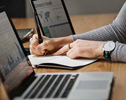 closeup of person working on business documents